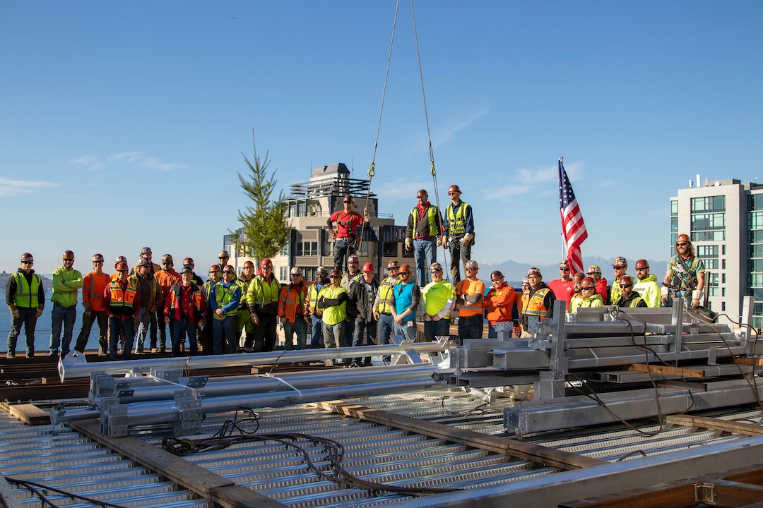 construction crew celebrating the final phase of construction